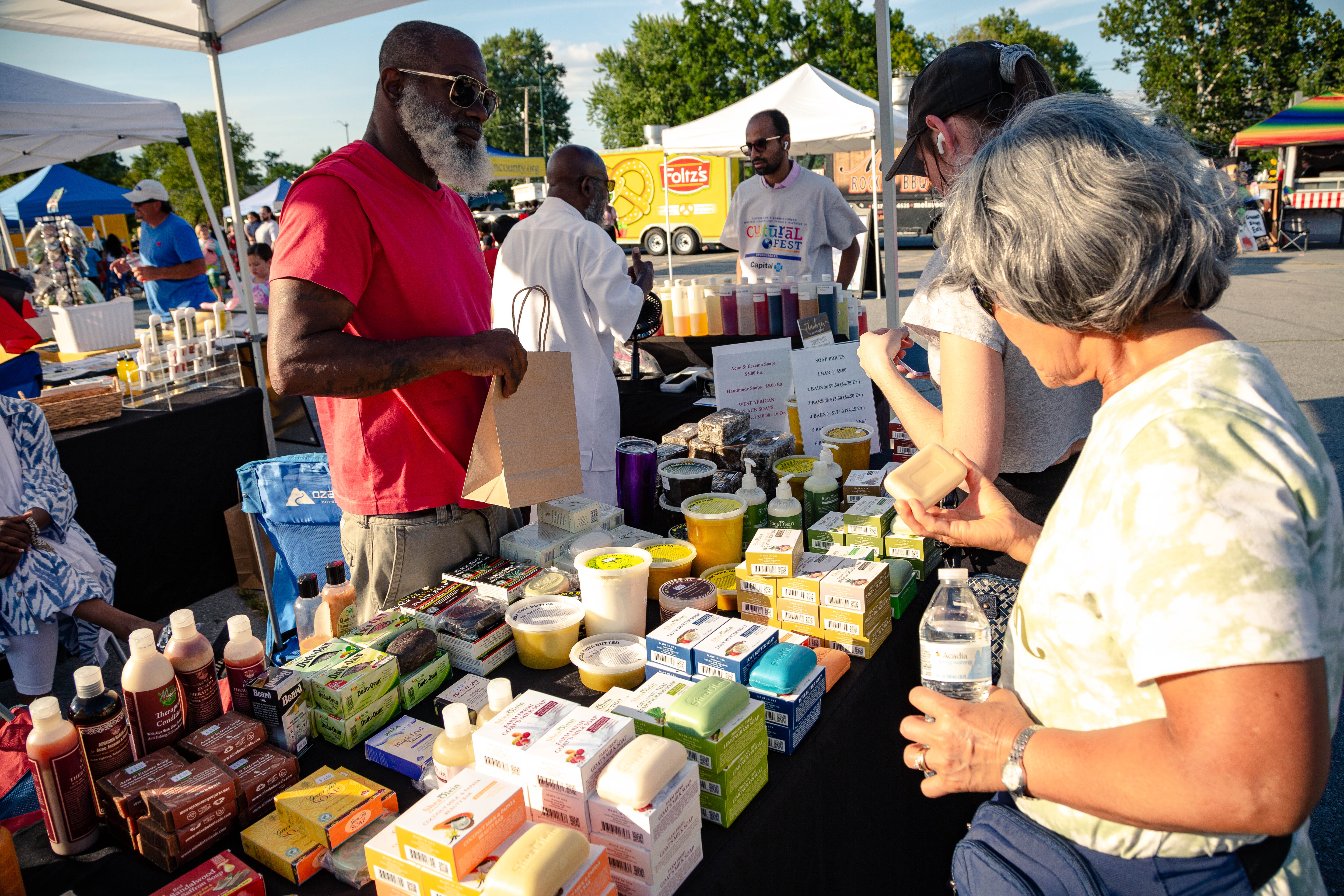 Vendor table showing soaps and lotions