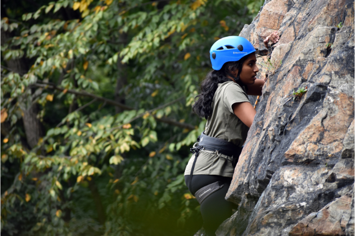 A girl rock climbing