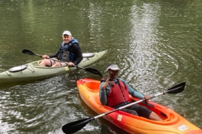 Two people in kayaks on the swatara creek