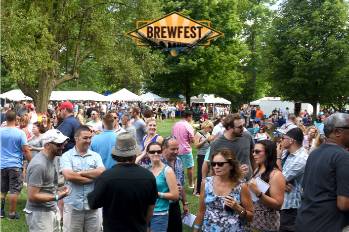 Attendees outside enjoying BrewFest together at Fort Hunter Park