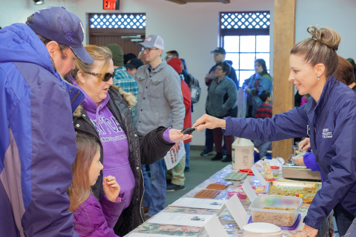 A family sampling Maple Sugar cubes