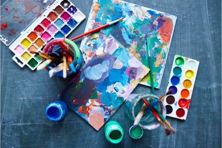 Paints, Paintbrushes, paintings on canvas