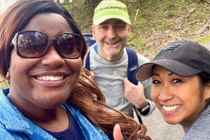 Volunteers smiling at camera