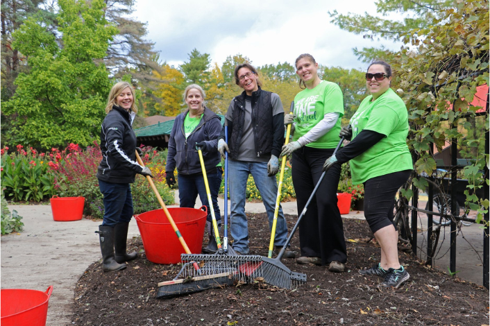 People holding outdoor tools