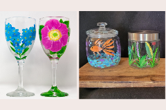 Wine glasses hand-painted with flowers and lidded glass jars painted with flowers and a goldfish